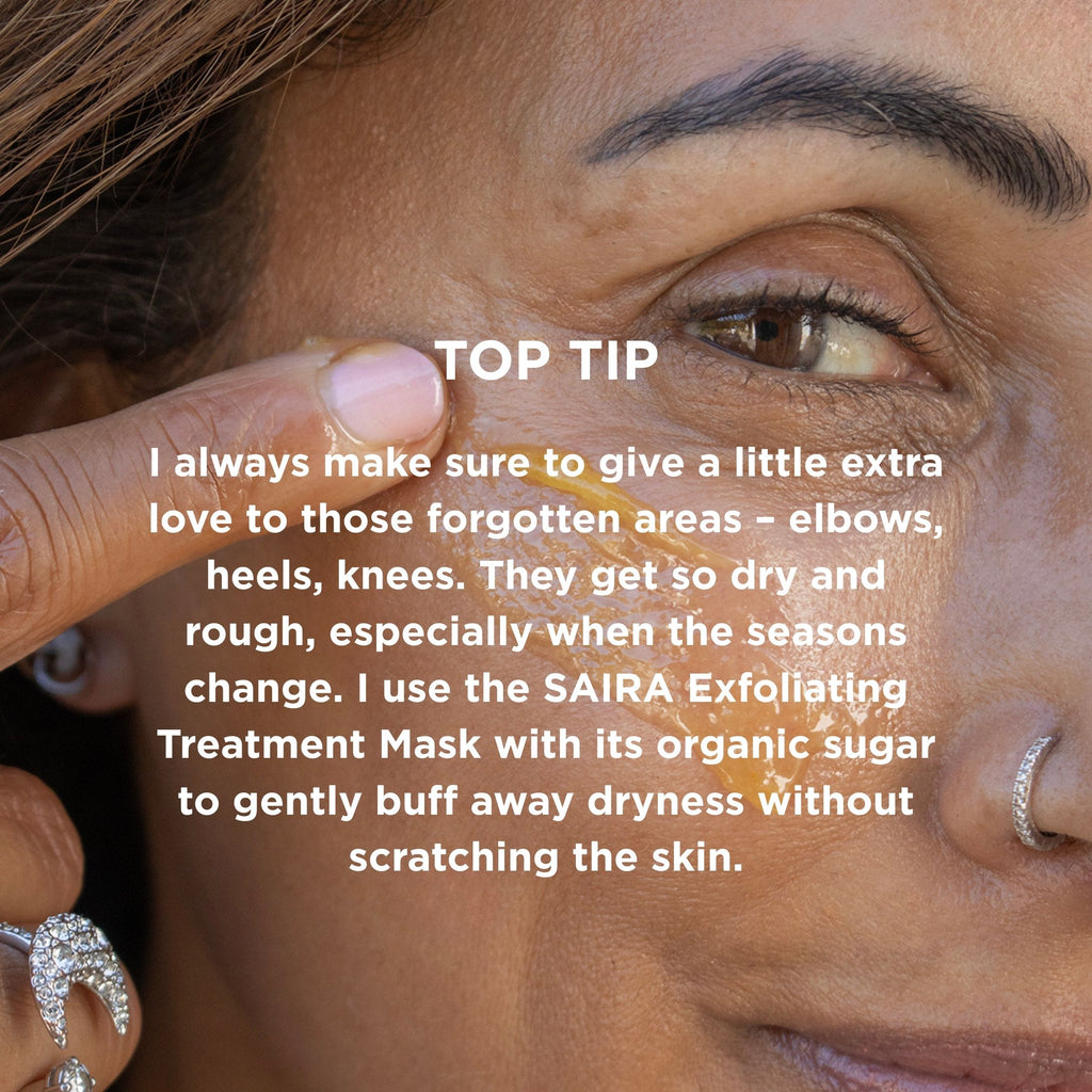 A close up of oils being applied to a face, captioned