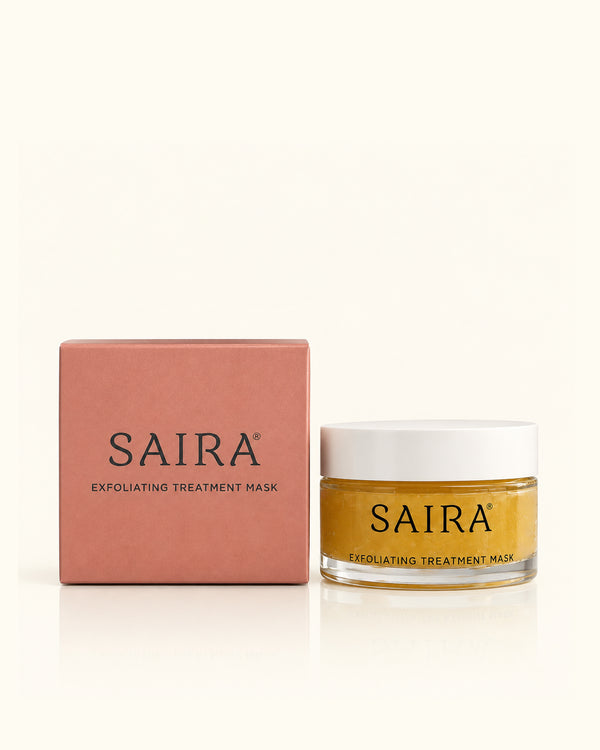 SAIRA Exfoliating Treatment Mask shown with its dusty pink packaging box and a clear glass jar containing a golden-yellow mask, set against a clean off-white background.