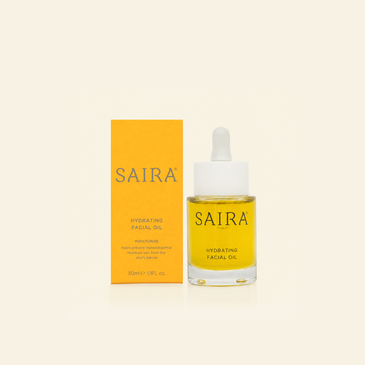 SAIRA Hydrating Facial Oil in a clear glass dropper bottle next to its yellow-orange packaging box, set against a solid cream background.
